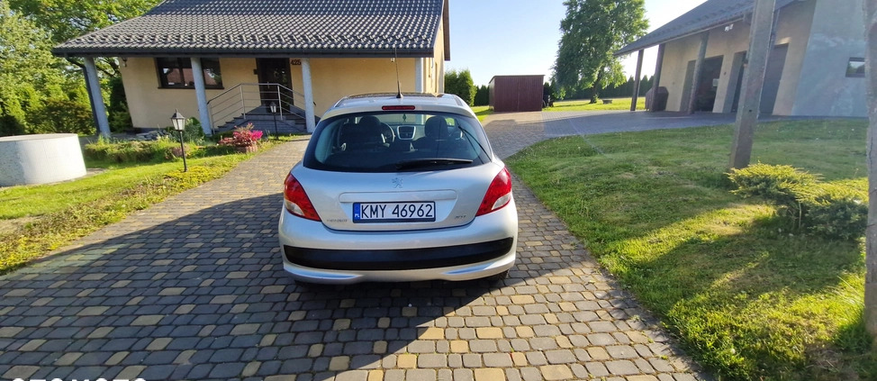 Peugeot 207 cena 16800 przebieg: 129107, rok produkcji 2010 z Bełchatów małe 407